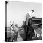 Enzo Tortora Standing on a Truck Observed by Two Farmers-null-Stretched Canvas