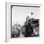 Enzo Tortora Standing on a Truck Observed by Two Farmers-null-Framed Photographic Print
