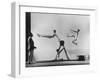 Erik Flensted Jensen, Coach of Danish Gymnastic Team, Watching as Three Men Perform-Gjon Mili-Framed Photographic Print