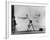 Erik Flensted Jensen, Coach of Danish Gymnastic Team, Watching as Three Men Perform-Gjon Mili-Framed Photographic Print