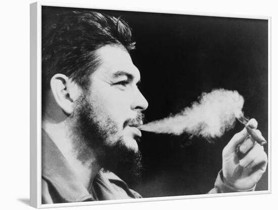 Ernesto 'Che' Guevara Exhaling Plume of Cigar, NYC, 1964-null-Framed Photo