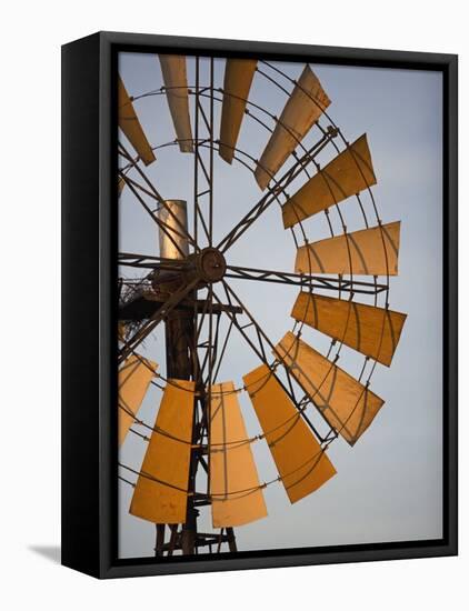 Erongo Region, Okahandja, the Fins of a Windmill Highlighted by the Setting Sun, Namibia-Mark Hannaford-Framed Stretched Canvas