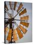 Erongo Region, Okahandja, the Fins of a Windmill Highlighted by the Setting Sun, Namibia-Mark Hannaford-Stretched Canvas