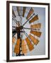 Erongo Region, Okahandja, the Fins of a Windmill Highlighted by the Setting Sun, Namibia-Mark Hannaford-Framed Premium Photographic Print