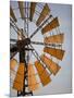 Erongo Region, Okahandja, the Fins of a Windmill Highlighted by the Setting Sun, Namibia-Mark Hannaford-Mounted Premium Photographic Print