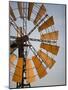 Erongo Region, Okahandja, the Fins of a Windmill Highlighted by the Setting Sun, Namibia-Mark Hannaford-Mounted Photographic Print