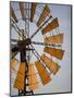 Erongo Region, Okahandja, the Fins of a Windmill Highlighted by the Setting Sun, Namibia-Mark Hannaford-Mounted Photographic Print