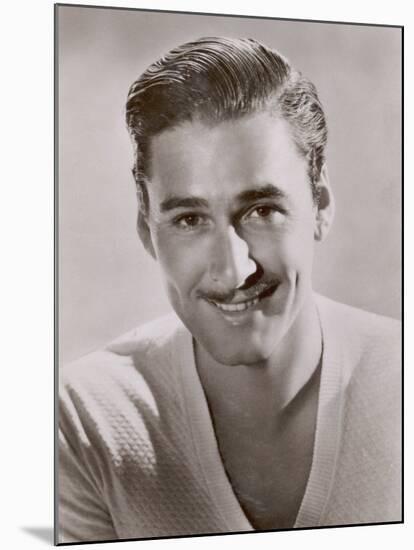 Errol Flynn Film Actor Best Known for His Swashbuckling Roles-null-Mounted Photographic Print