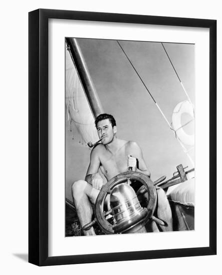 Errol Flynn Relaxing on His Yacht, October 20, 1937-null-Framed Photo