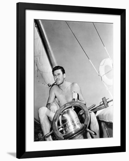 Errol Flynn Relaxing on His Yacht, October 20, 1937-null-Framed Photo