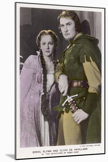 Erroll Flynn as Robin and Olivia de Havilland as Maid Marian in "The Adventures of Robin Hood" 1938-null-Mounted Art Print