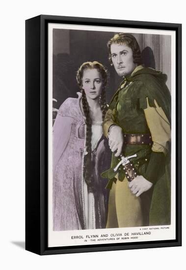 Erroll Flynn as Robin and Olivia de Havilland as Maid Marian in "The Adventures of Robin Hood" 1938-null-Framed Stretched Canvas