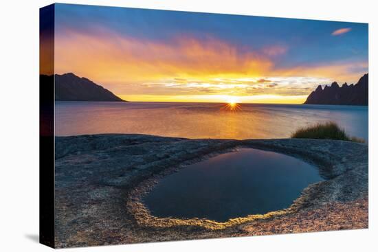 Ersfjord and Steinfjord fjords lit by midnight sun from rock formation at Tungeneset viewpoint-Roberto Moiola-Stretched Canvas