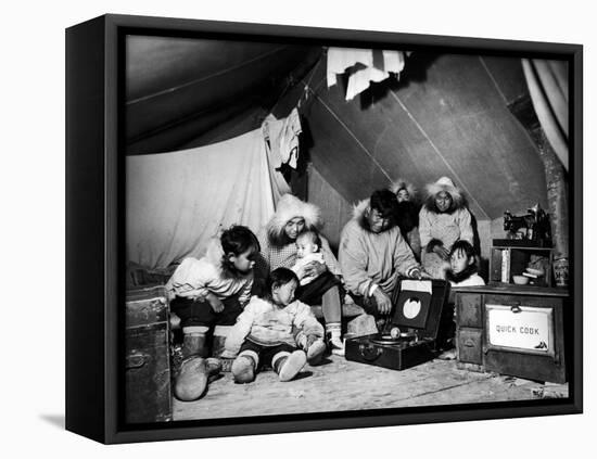 Eskimo Family Admiring their Modern Conveniences, a Victrola, a Sewing Machine and a Stove-Margaret Bourke-White-Framed Stretched Canvas