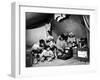 Eskimo Family Admiring their Modern Conveniences, a Victrola, a Sewing Machine and a Stove-Margaret Bourke-White-Framed Photographic Print