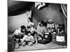 Eskimo Family Admiring their Modern Conveniences, a Victrola, a Sewing Machine and a Stove-Margaret Bourke-White-Mounted Photographic Print