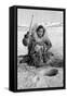 Eskimo Woman Fishing through Ice in Alaska Photograph - Alaska-Lantern Press-Framed Stretched Canvas