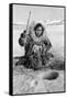 Eskimo Woman Fishing through Ice in Alaska Photograph - Alaska-Lantern Press-Framed Stretched Canvas