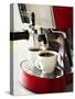Espresso Running into Espresso Cups-Gerrit Buntrock-Stretched Canvas