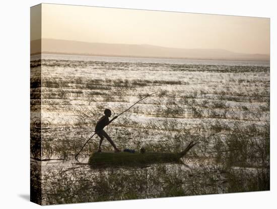 Ethiopia, Lake Awassa; a Young Boy Punts a Traditional Reed Tankwa Through the Reeds-Niels Van Gijn-Stretched Canvas