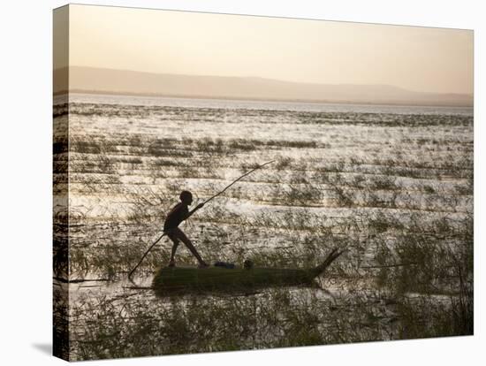 Ethiopia, Lake Awassa; a Young Boy Punts a Traditional Reed Tankwa Through the Reeds-Niels Van Gijn-Stretched Canvas