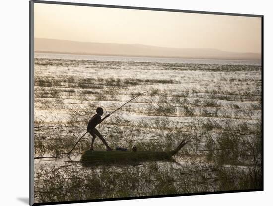 Ethiopia, Lake Awassa; a Young Boy Punts a Traditional Reed Tankwa Through the Reeds-Niels Van Gijn-Mounted Photographic Print