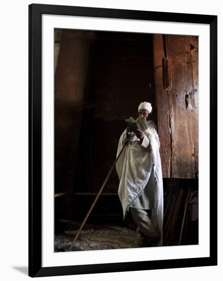 Ethiopia, Lalibela; a Priest in One of the Ancient Rock-Hewn Churches of Lalibela-Niels Van Gijn-Framed Photographic Print