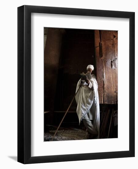 Ethiopia, Lalibela; a Priest in One of the Ancient Rock-Hewn Churches of Lalibela-Niels Van Gijn-Framed Photographic Print