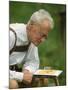 Ethologist Karl Von Frisch Testing the Ability of Bees to Perceive Color in His Home Garden-Nina Leen-Mounted Premium Photographic Print