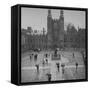 Eton Students in Traditional Tails and Striped Trousers, with Umbrellas, Standing in the Rain-Margaret Bourke-White-Framed Stretched Canvas