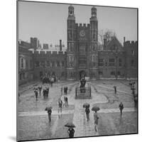 Eton Students in Traditional Tails and Striped Trousers, with Umbrellas, Standing in the Rain-Margaret Bourke-White-Mounted Photographic Print