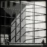 Two People Sitting Outside a Modern Glass Building-Eudald Castells-Framed Stretched Canvas