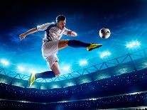 Soccer Player in Action on Night Stadium Background-Eugene Onischenko-Photographic Print