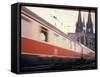 Eurailpass in Europe: Germany's Parsifal Express Speeding Past Cologne Cathedral-Carlo Bavagnoli-Framed Stretched Canvas