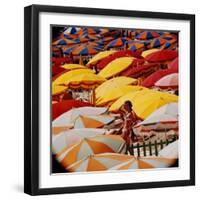 Europe Beach Scene Crowded with Colorful Umbrellas and a Bikini-Clad Young Woman-Ralph Crane-Framed Photographic Print