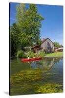 Europe, Germany, Brandenburg, Spreewald, Leipe, Traditional Houses at Water Channel, Canoeists-Chris Seba-Stretched Canvas