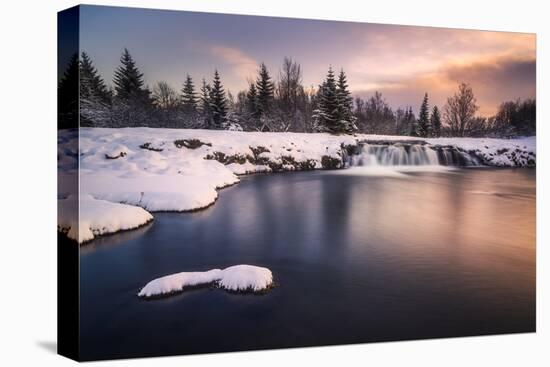 Europe, Iceland, Reykjavik, Waterfall At Sunset The Reykjavik-Aliaume Chapelle-Stretched Canvas