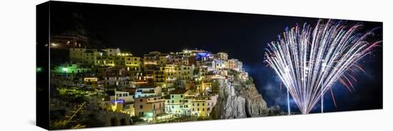 Europe, Italy, Liguria. Fireworks in Manarola for San Lorenzo-Catherina Unger-Stretched Canvas