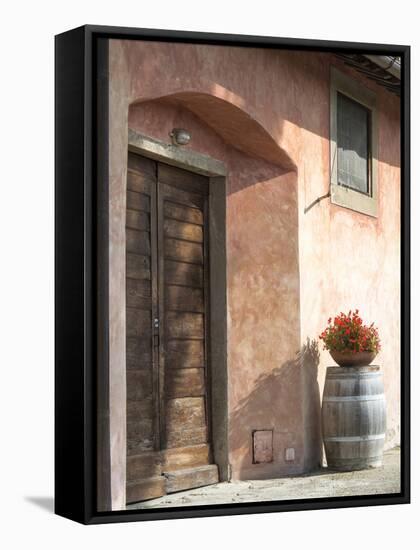 Europe, Italy, Tuscany. Flower Pot on Old Wine Barrel at Winery-Julie Eggers-Framed Stretched Canvas