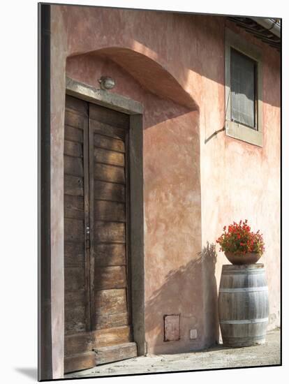 Europe, Italy, Tuscany. Flower Pot on Old Wine Barrel at Winery-Julie Eggers-Mounted Photographic Print