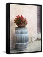 Europe, Italy, Tuscany. Flower Pot on Old Wine Barrel at Winery-Julie Eggers-Framed Stretched Canvas