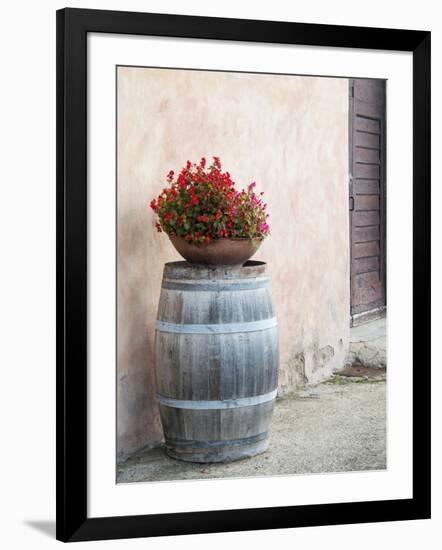 Europe, Italy, Tuscany. Flower Pot on Old Wine Barrel at Winery-Julie Eggers-Framed Photographic Print