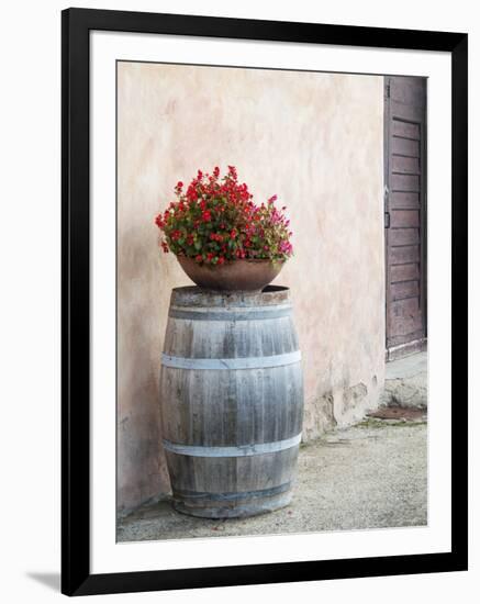 Europe, Italy, Tuscany. Flower Pot on Old Wine Barrel at Winery-Julie Eggers-Framed Photographic Print