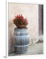 Europe, Italy, Tuscany. Flower Pot on Old Wine Barrel at Winery-Julie Eggers-Framed Photographic Print