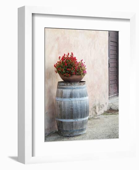 Europe, Italy, Tuscany. Flower Pot on Old Wine Barrel at Winery-Julie Eggers-Framed Photographic Print