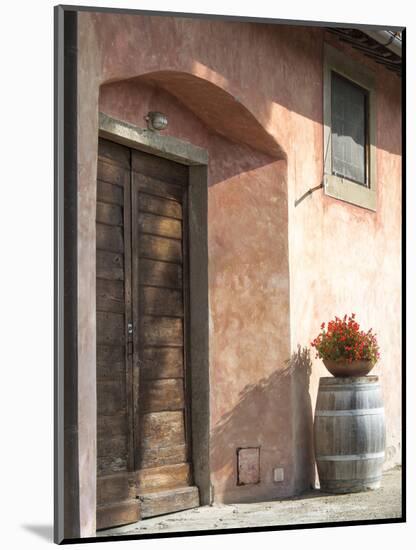 Europe, Italy, Tuscany. Flower Pot on Old Wine Barrel at Winery-Julie Eggers-Mounted Photographic Print