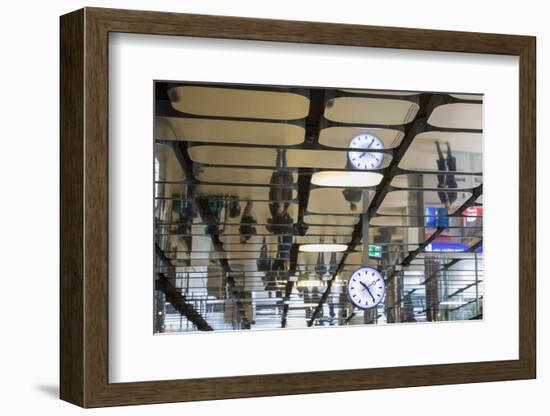 Europe, Netherlands, Amsterdam. Commuters reflected in ceiling of central train station.-Jaynes Gallery-Framed Photographic Print