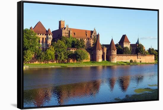 Europe, Poland, Pomerania, Medieval Malbork Castle, Marienburg Fortress of Mary, UNESCO Site-Christian Kober-Framed Stretched Canvas