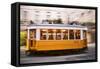 Europe, Portugal, Lisbon, a Speeding Tram (Streetcar) in the City Center-Alex Robinson-Framed Stretched Canvas