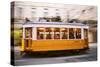 Europe, Portugal, Lisbon, a Speeding Tram (Streetcar) in the City Center-Alex Robinson-Stretched Canvas